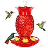 Fchstaer red glass pineapple hummingbird feeder with six feeding ports attracts hummingbirds.