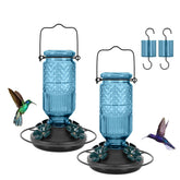 FEED GARDEN glass hummingbird feeder with bee guard ports for outdoor feeding.