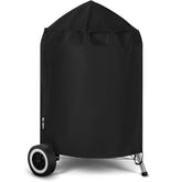 FEVERCOVER grill cover on Weber 22-inch charcoal kettle protects against rain and dust.