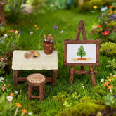 FHNQRQN Fairy Studio Easel showcases artisan-detail miniatures for outdoor displays.