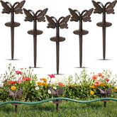 Fiwochic butterfly hose guide stake in rusty finish protecting plants while guiding the hose.