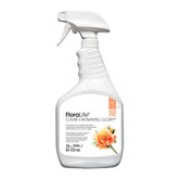 Floralife Crowning Glory Spray bottle applying a clear finish to blooms