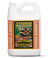 FoxFarm Tiger Bloom bottle pour demonstrating quick flowering nutrient delivery
