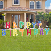 Frcctre 14-piece birthday yard signs displayed outdoors for vibrant party ambiance.