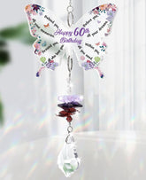 Funnli butterfly crystal suncatcher casting colorful light through windows