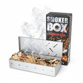 Fving smoker box for gas grill with hinged lid enhances wood chip flavor.