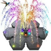 GAIZERL snowflake-style fountain with LED lights creates magical nighttime ambiance.