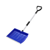 GardenPal snow shovel on a driveway with a large-capacity blade for quick clearing.