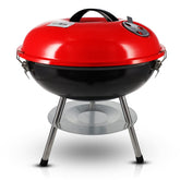 Gas One 14-inch portable grill lid showing heat retention for even cooking.