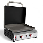 Gas One flat-top grill with lid for portable outdoor cooking at family gatherings.