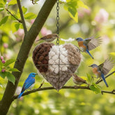 Generic Handmade Alpaca Fiber Bird Nesting Heart on a branch providing cozy nesting space.