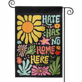 Generic Hate Has No Home Here flag with double-sided print visible from both angles on a porch