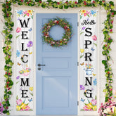 Generic Hello Spring porch banner on front door with colorful florals for welcoming entry