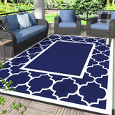 GENIMO outdoor rug 6x9 in blue and white, foldable for easy transportation.