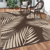 GENIMO outdoor rug with palm leaf pattern enhances patio decor and comfort