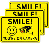 Giftape Smile On Camera Sign front view enhances outdoor visibility for home security