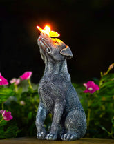 Goodeco dog statue with solar butterfly lights adds charming evening ambiance to gardens.