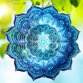 Goolyrusim wind spinner mandala rich blue 12inch gleams in sunlight with vibrant outdoor color.