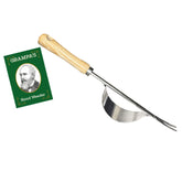 Grampa's Weeder hand tool close-up shows a sturdy weed removal design.