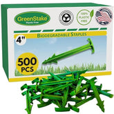 GreenStake 4-inch biodegradable stake securing landscape fabric for durable ground cover.