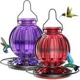 Grete Gotye glass hummingbird feeder in red ball shape attracts hummingbirds and enhances garden decor