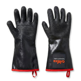 Grillixa 932°F gloves demonstrating heat resistance for high-heat grilling.
