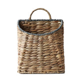 GYASVWU woven hanging basket with water hyacinth on wall for rustic decor.