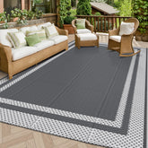HappyTrends outdoor rug laid flat on a sunny patio, waterproof and easy to clean.