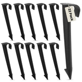 Harrier Hardware half-inch tubing anchor stake secures irrigation line in soil for stable watering.