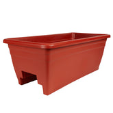 The HC Companies 24-inch deck rail planter on a wood rail for flowers and herbs