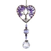 H&D Hyaline & Dora tree life sun catcher on window creating rainbow reflections