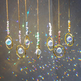 HDCRYSTALGIFTS seven crystal suncatchers create vivid rainbows in sunlight.
