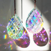 HDCRYSTALGIFTS crystal sun catcher in AB rainbow finish brightens windows with dancing light.