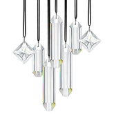 HDCRYSTALGIFTS Set 7 clear crystal prism sun catcher in a sunlit window creating rainbow display