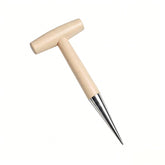 Heiksyb seed dibber with wooden T-handle creates uniform planting holes for precise sowing.