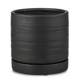 HERDUK 6-inch ceramic planter with drainage hole for indoor display.