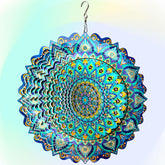 Hippolytusiart wind spinner mandala peacock blue ocean front view bright outdoor garden