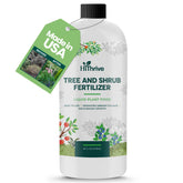 HiThrive tree and shrub food bottle ready to pour for easy mixing.
