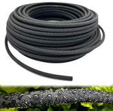 Hkvoxim 1/4-inch soaker hose laid along garden bed for efficient watering.