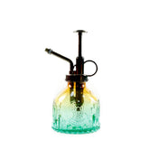 Hniuyun glass plant mister bottle with durable design for indoor watering.