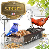 Homebird window feeder close-up with strong suction cups for secure bird viewing.