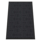 HOMEK door mat with deep grooves captures dirt and moisture at the entry.