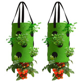 Homyhoo upside-down tomato planter bag hanging on a deck for space-saving gardening.