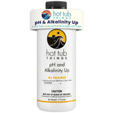 Hot Tub Things pH Up bottle pour demonstrates easy dosing for balanced spa water.