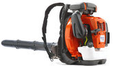Husqvarna 570BTS worn with ventilated backpack harness for comfortable use.