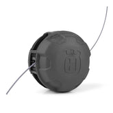 Husqvarna RapidReplace trimmer head loading for quick reloads during yard work