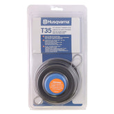Husqvarna T35 professional Tap Advance spool shows easy reload feature for fast maintenance.