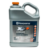 Husqvarna XP+ 2-stroke oil bottle pour for easy 50:1 mixing and clean lubrication