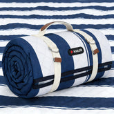 HX&OD outdoor picnic blanket 80x60 laid out for family seating on grass.