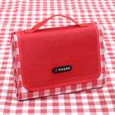 HX&OD picnic blanket with waterproof bottom for damp grass and wet sand.